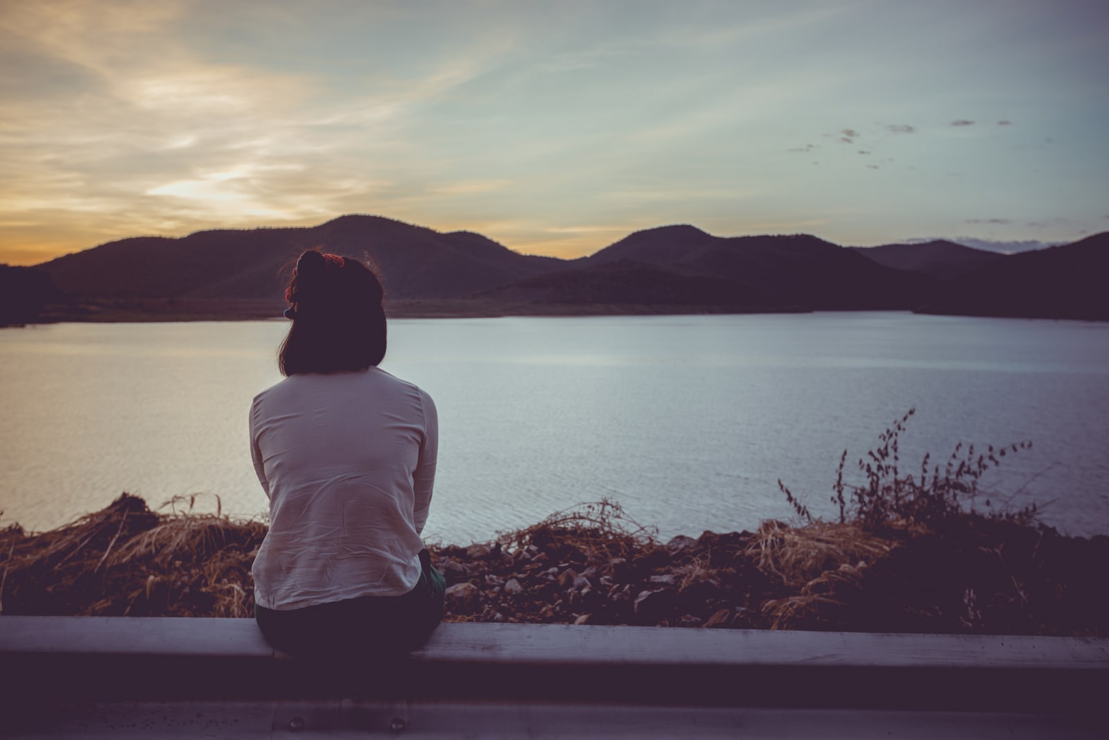 woman sitting alone outdoor