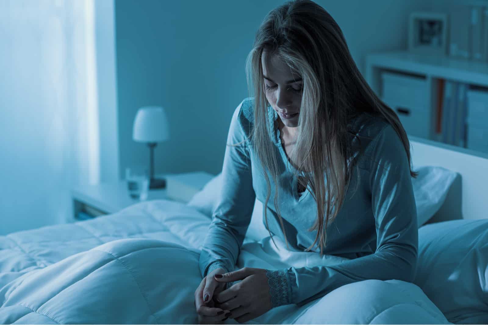 Depressed woman awake in the night