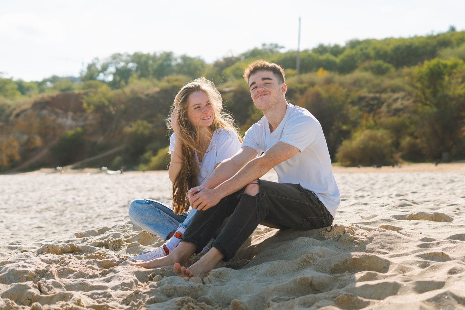 couple at the beach talking
