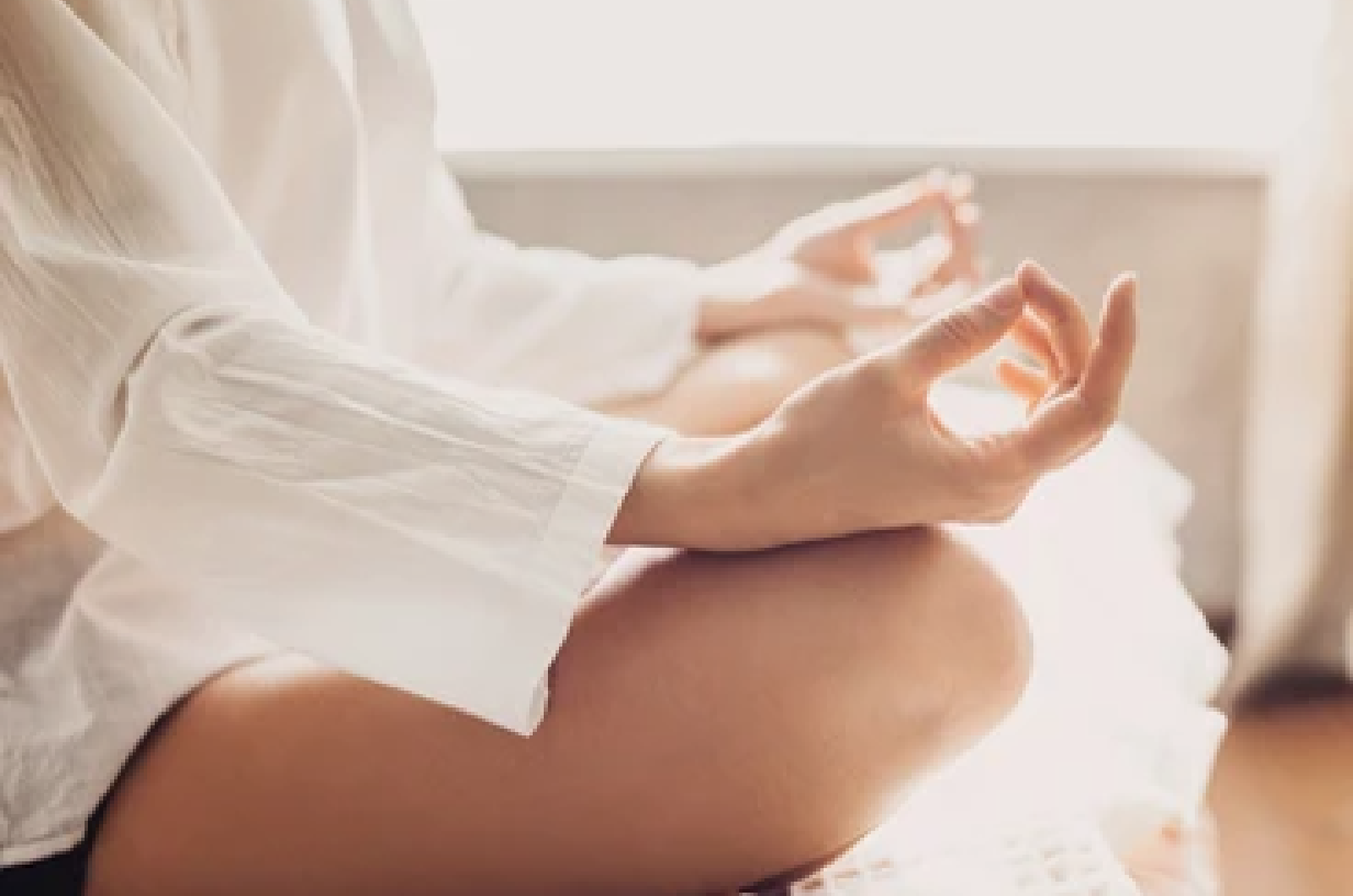 woman meditating at home
