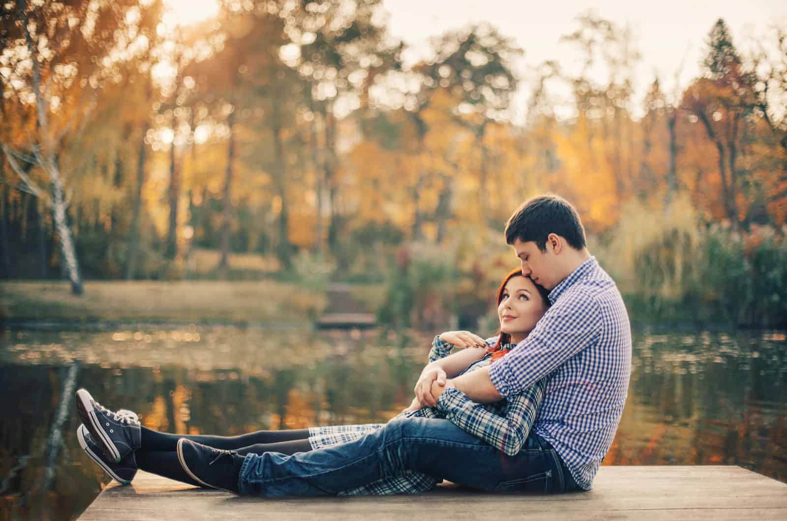 couple sitting on a deck