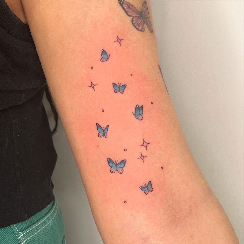 Mini Blue Butterflies Tattoo