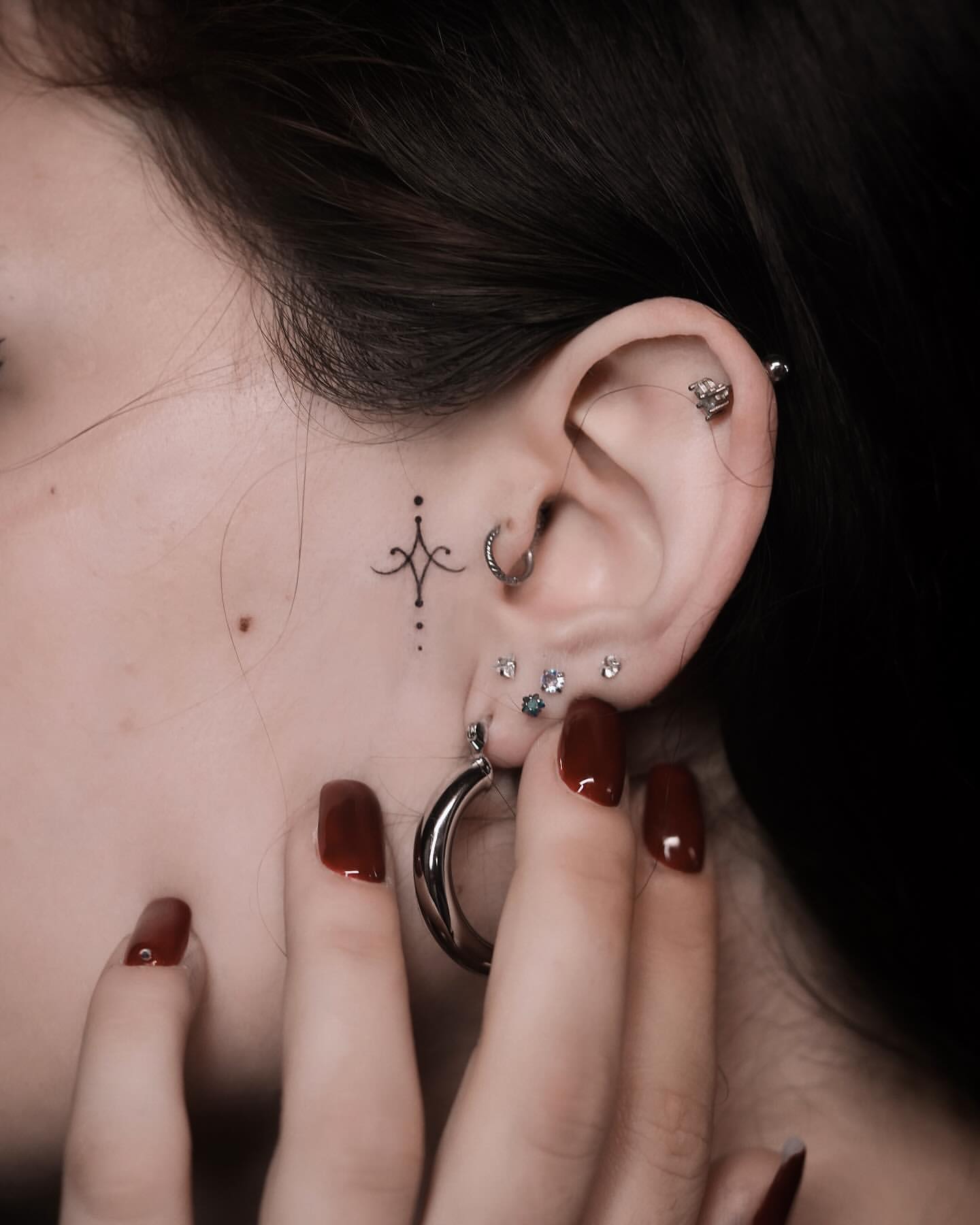 tiny abstract tattoo