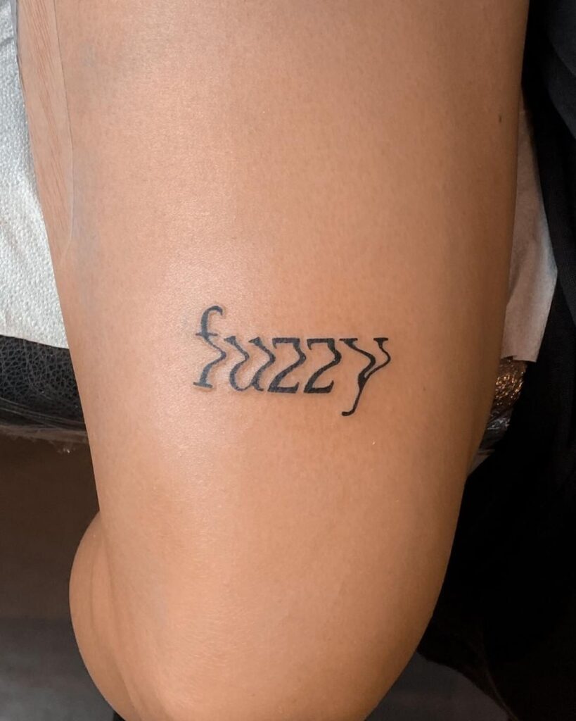 Playful “Fuzzy” Lettering Tattoo