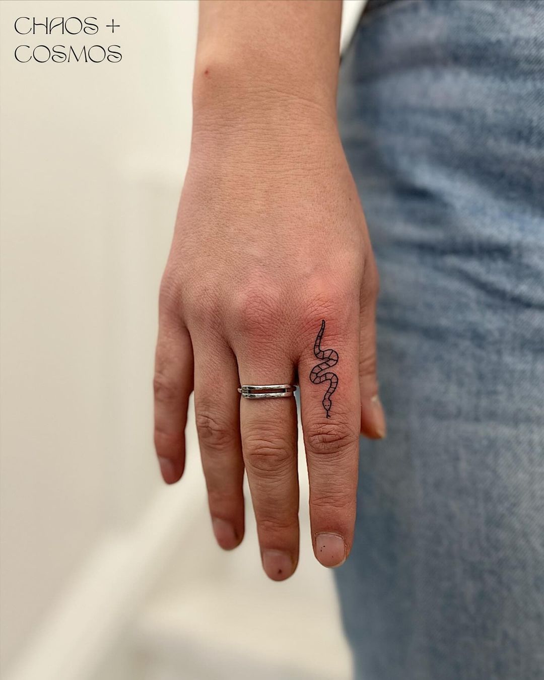 tiny snake tattoo