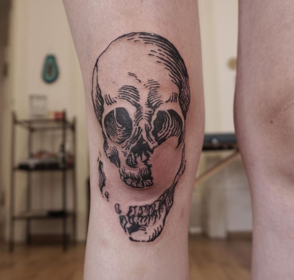 Broken Skull Knee Tattoo