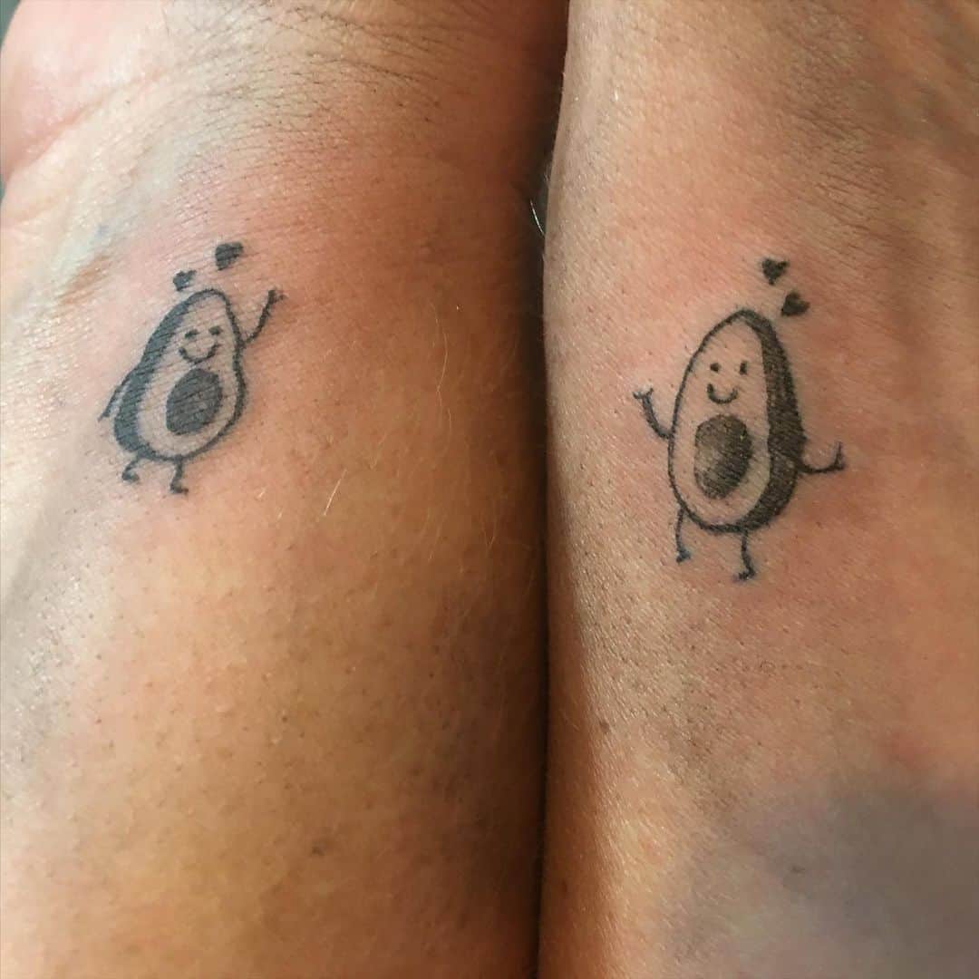 Adorable avocado matching best friend tattoo